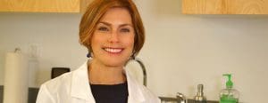 Dr. Krista Lauer headshot Lice Clinics of America's medical director