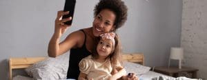 Mom and daughter taking a selfie