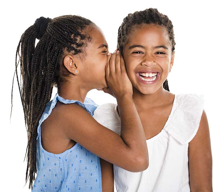 Two african american twins whispering a secret